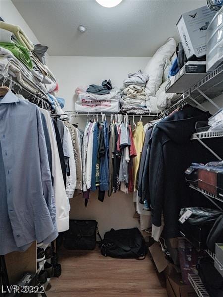 50 Aura De Blanco St Unit 13202, Henderson, NV 89074 - walk in closet featuring wood finished floors
