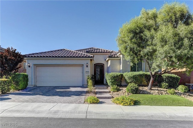 9964 Peaceful Peaks Ave, Las Vegas, NV 89166 - mediterranean / spanish home with driveway, stucco siding, a garage, and a tiled roof