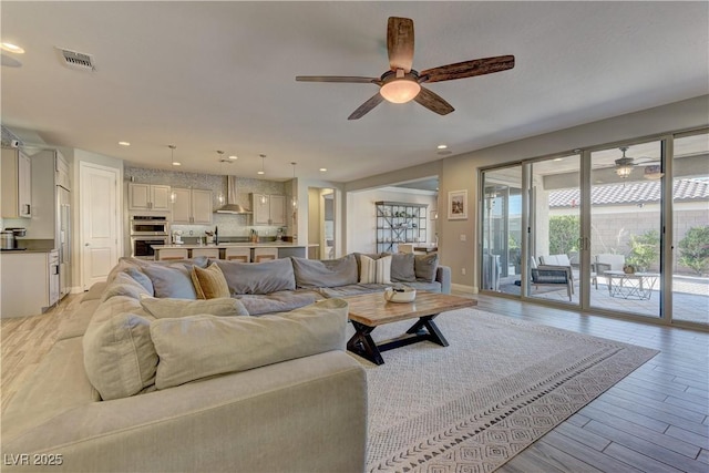 9964 Peaceful Peaks Ave, Las Vegas, NV 89166 - living room with ceiling fan, light wood finished floors, and recessed lighting