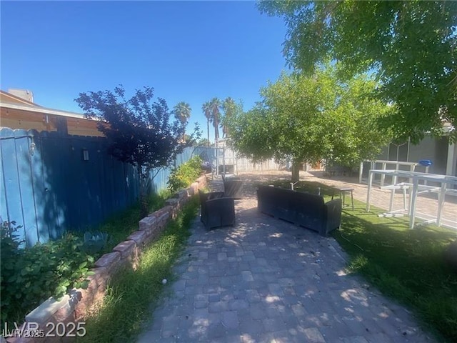 1841 Skywood Way, Las Vegas, NV 89142 - fenced backyard featuring a patio