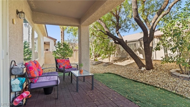 7723 Widewing Dr, North Las Vegas, NV 89084 - fenced backyard featuring a patio