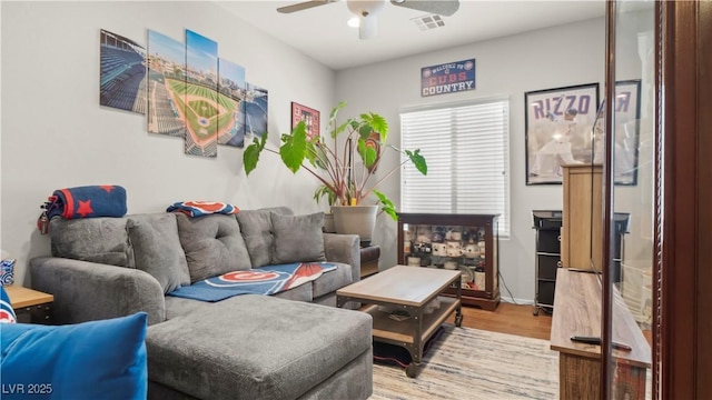 7723 Widewing Dr, North Las Vegas, NV 89084 - living area with a ceiling fan and wood finished floors