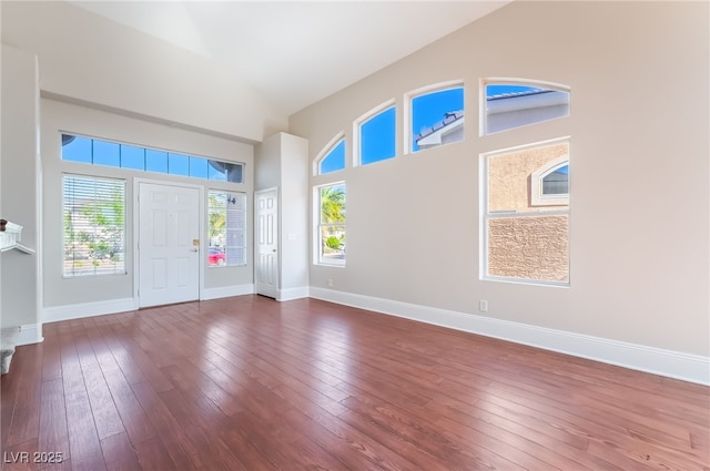 258 Horizon Pointe Cir, Henderson, NV 89012 - foyer featuring high vaulted ceiling and wood-type flooring