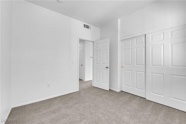 8501 W University Ave Unit 2053, Las Vegas, NV 89147 - unfurnished bedroom featuring carpet floors and a closet