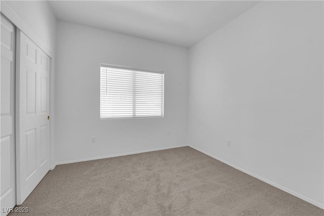 8501 W University Ave Unit 2053, Las Vegas, NV 89147 - unfurnished bedroom featuring carpet and a closet