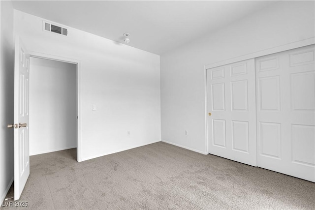 8501 W University Ave Unit 2053, Las Vegas, NV 89147 - unfurnished bedroom featuring carpet and a closet