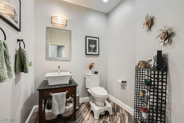2458 Tour Edition Dr, Henderson, NV 89074 - bathroom with wood finished floors and vanity