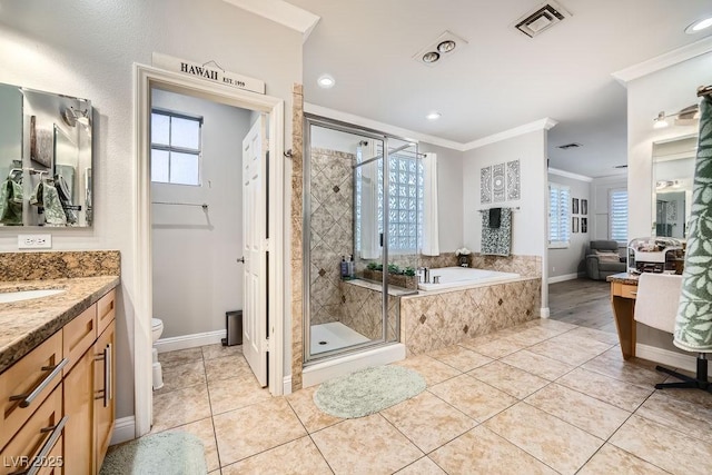 2458 Tour Edition Dr, Henderson, NV 89074 - bathroom with crown molding, vanity, a garden tub, a stall shower, and tile patterned floors