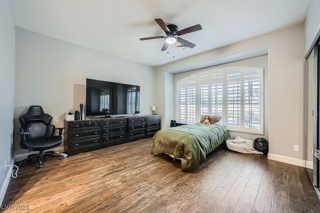 2458 Tour Edition Dr, Henderson, NV 89074 - bedroom with wood finished floors and ceiling fan