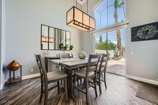 2458 Tour Edition Dr, Henderson, NV 89074 - dining room featuring a high ceiling and wood finished floors