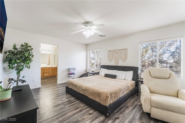 8179 Palace Monaco Ave, Las Vegas, NV 89117 - bedroom with dark wood-style flooring, ensuite bath, and ceiling fan