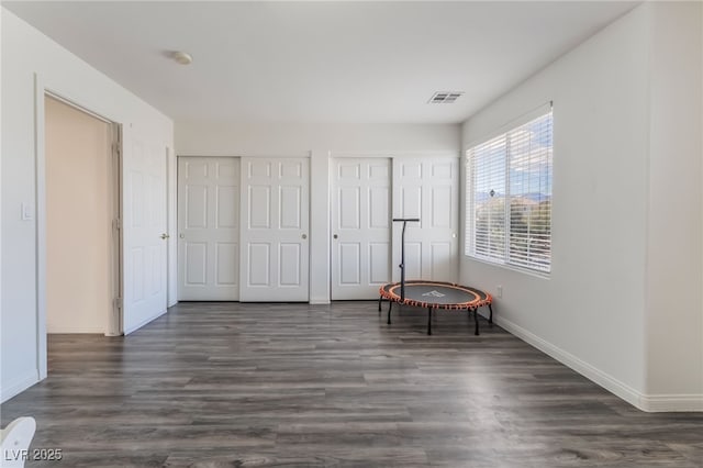 8179 Palace Monaco Ave, Las Vegas, NV 89117 - sitting room featuring dark wood-style flooring