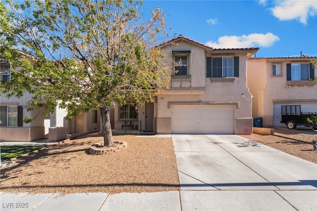 8179 Palace Monaco Ave, Las Vegas, NV 89117 - view of front of property with stucco siding, an attached garage, concrete driveway, and a tile roof
