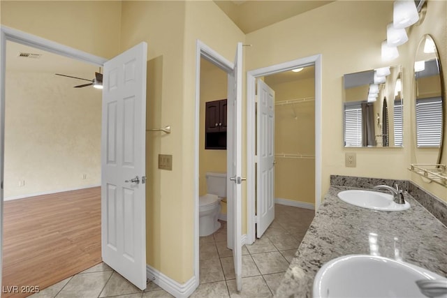 4423 Sophia Way N, Las Vegas, NV 89032 - bathroom with double vanity, tile patterned flooring, a closet, and ceiling fan