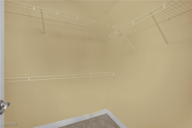 4423 Sophia Way N, Las Vegas, NV 89032 - walk in closet featuring light tile patterned floors