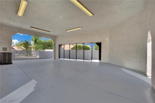 4423 Sophia Way N, Las Vegas, NV 89032 - spare room with finished concrete floors and a textured ceiling
