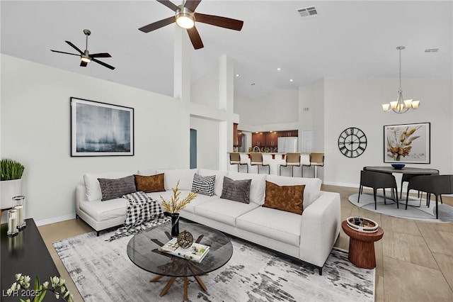 4423 Sophia Way N, Las Vegas, NV 89032 - living room with a ceiling fan, a chandelier, high vaulted ceiling, and recessed lighting