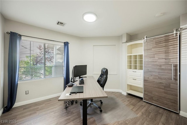2547 Sundew Ave, Henderson, NV 89052 - office area with wood finished floors and baseboards