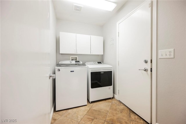 2547 Sundew Ave, Henderson, NV 89052 - laundry room with washing machine and dryer and cabinet space