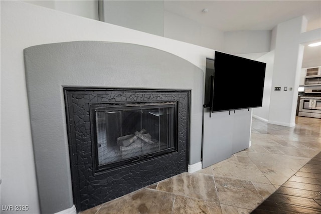 2547 Sundew Ave, Henderson, NV 89052 - detailed view of stainless steel appliances and a glass covered fireplace