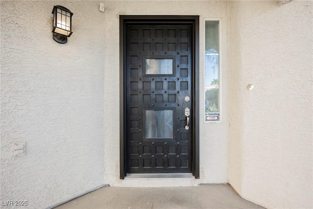 2547 Sundew Ave, Henderson, NV 89052 - doorway to property with stucco siding