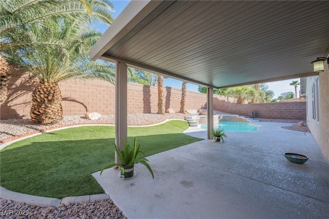 2547 Sundew Ave, Henderson, NV 89052 - fenced backyard featuring a patio