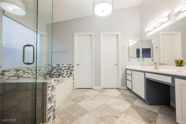 2547 Sundew Ave, Henderson, NV 89052 - bathroom featuring vanity, a garden tub, and a shower stall