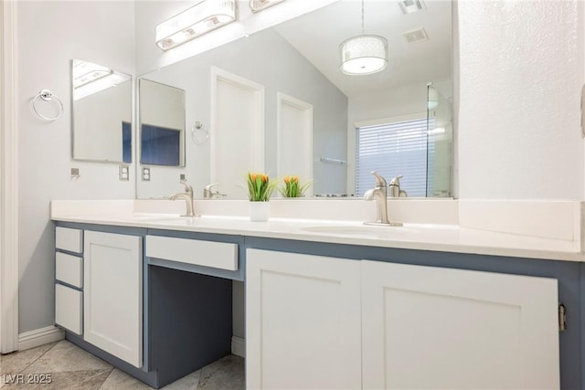 2547 Sundew Ave, Henderson, NV 89052 - bathroom with double vanity and tile patterned floors