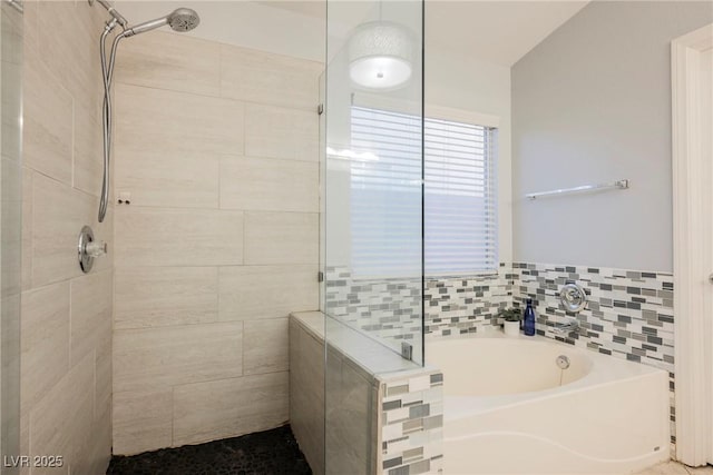 2547 Sundew Ave, Henderson, NV 89052 - bathroom with a tile shower and a garden tub