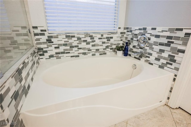 2547 Sundew Ave, Henderson, NV 89052 - bathroom featuring a bath and backsplash