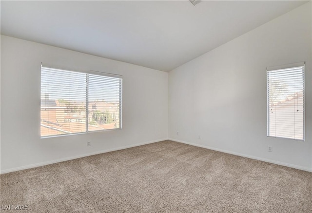 9520 Silver Frost St, Las Vegas, NV 89123 - carpeted empty room with healthy amount of natural light and vaulted ceiling