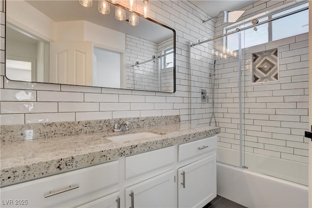 9520 Silver Frost St, Las Vegas, NV 89123 - full bath with vanity, combined bath / shower with glass door, backsplash, and plenty of natural light
