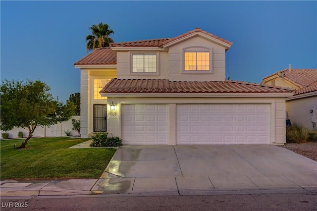 9520 Silver Frost St, Las Vegas, NV 89123 - mediterranean / spanish-style home with a tile roof, driveway, a front yard, and a garage