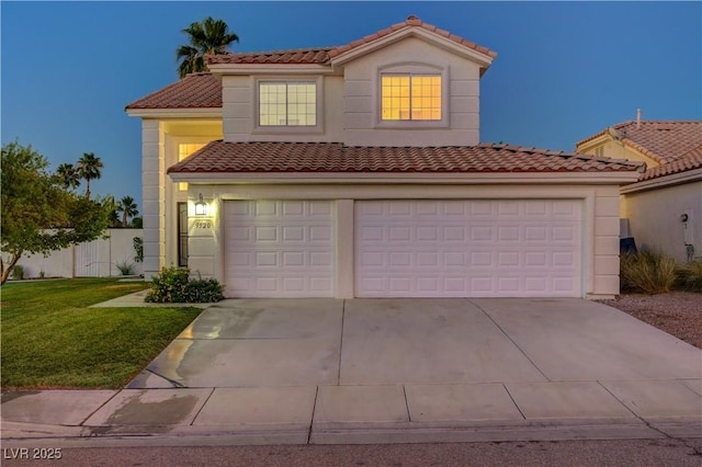 9520 Silver Frost St, Las Vegas, NV 89123 - mediterranean / spanish-style house featuring a tiled roof, driveway, a front lawn, and an attached garage