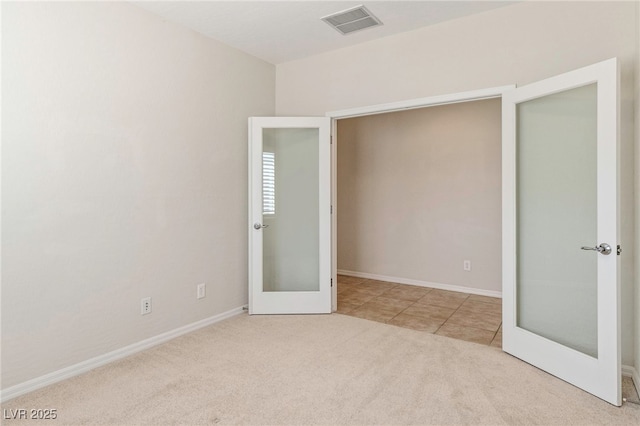 2425 Sky Watcher St, Henderson, NV 89044 - unfurnished bedroom with carpet floors and french doors