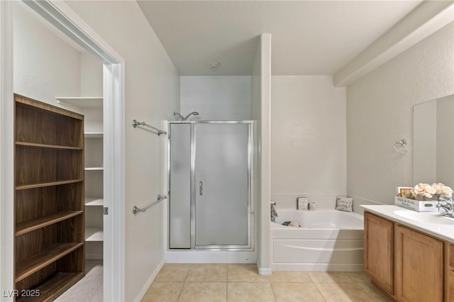 2425 Sky Watcher St, Henderson, NV 89044 - full bathroom featuring a stall shower, a garden tub, vanity, and tile patterned floors