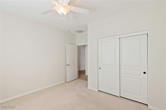 2425 Sky Watcher St, Henderson, NV 89044 - unfurnished bedroom featuring light colored carpet, a closet, and a ceiling fan
