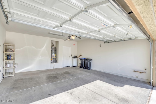 2425 Sky Watcher St, Henderson, NV 89044 - garage with a garage door opener and water heater