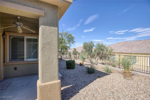 2425 Sky Watcher St, Henderson, NV 89044 - view of yard with a ceiling fan and a patio area