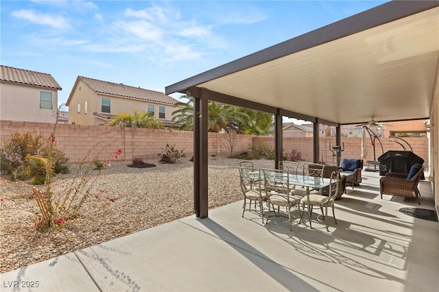 209 Centocelle Ave, Las Vegas, NV 89183 - fenced backyard with a ceiling fan, a patio area, outdoor dining space, and area for grilling