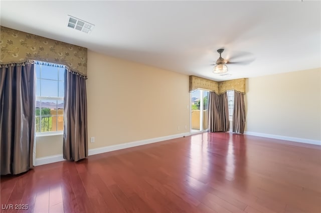 1152 Highbury Grove St, Henderson, NV 89002 - unfurnished room featuring wood finished floors, ceiling fan, and plenty of natural light