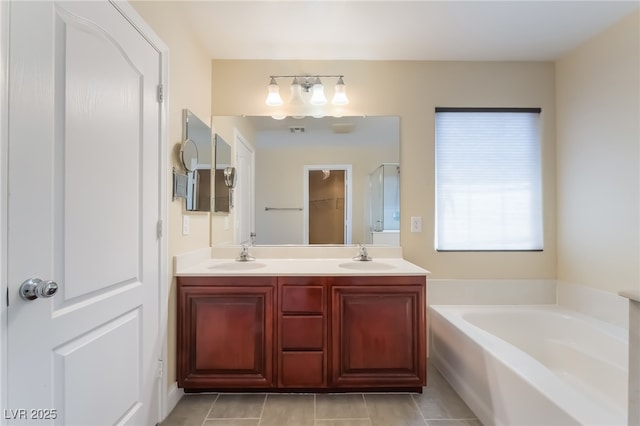 1152 Highbury Grove St, Henderson, NV 89002 - full bathroom with a bath, double vanity, and tile patterned floors