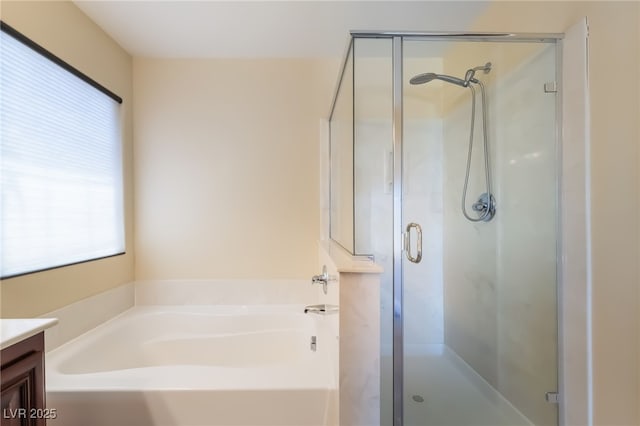 1152 Highbury Grove St, Henderson, NV 89002 - full bath featuring plenty of natural light, a stall shower, vanity, and a garden tub