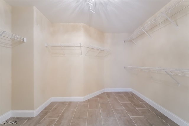 1152 Highbury Grove St, Henderson, NV 89002 - walk in closet featuring tile patterned flooring