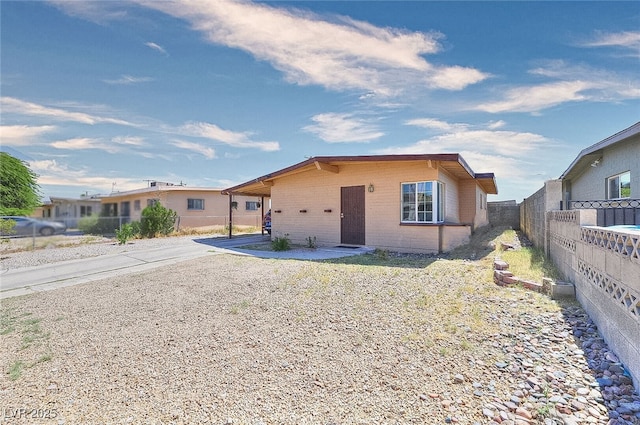 304 N Minnesota St, Las Vegas, NV 89107 - ranch-style house with driveway and brick siding