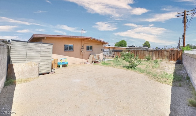 304 N Minnesota St, Las Vegas, NV 89107 - rear view of property featuring a fenced backyard