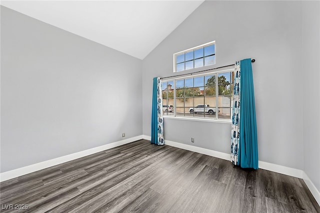 9405 Crosspointe Ave, Las Vegas, NV 89117 - empty room with wood finished floors and high vaulted ceiling