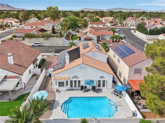 9405 Crosspointe Ave, Las Vegas, NV 89117 - aerial perspective of suburban area with a pool area and mountains