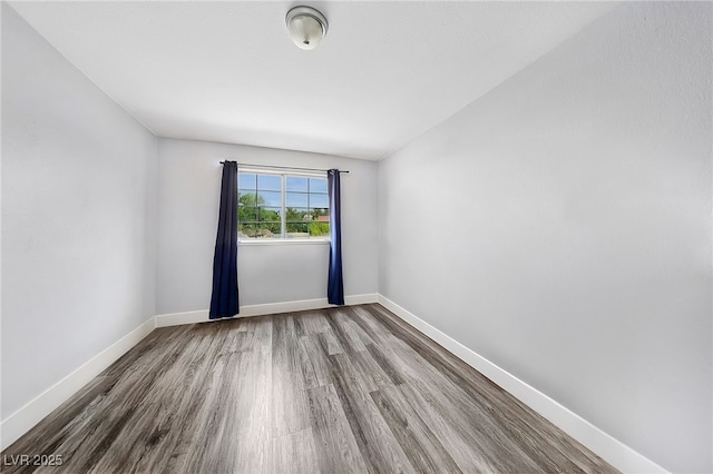 9405 Crosspointe Ave, Las Vegas, NV 89117 - empty room with wood finished floors and baseboards