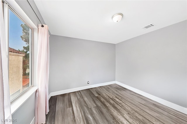 9405 Crosspointe Ave, Las Vegas, NV 89117 - empty room with wood finished floors and baseboards